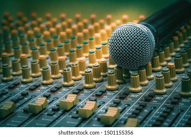 Microphone Placed Together With The Audio Mixer In The Recording Room, Vintage Film Style.