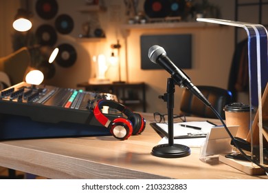 Microphone And Professional Mixing Console On Table In Radio Studio