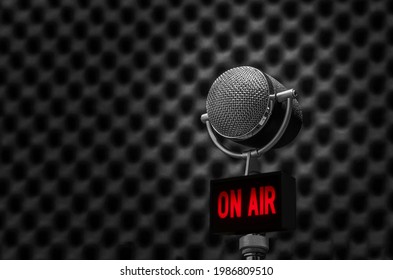 microphone in radio station studio and on air sign