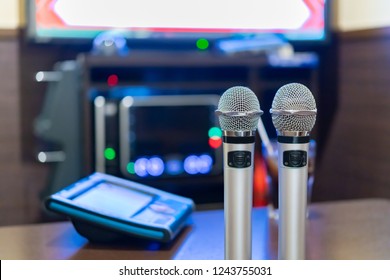 Microphone And Remote Control In Karaoke Box