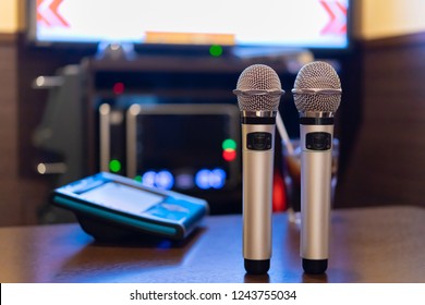 Microphone And Remote Control In Karaoke Box