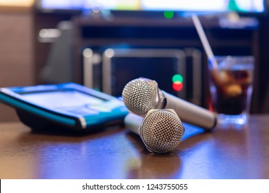 Microphone And Remote Control In Karaoke Box