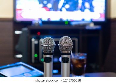 Microphone And Remote Control In Karaoke Box