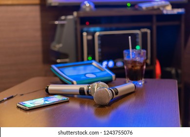 Microphone And Remote Control In Karaoke Box