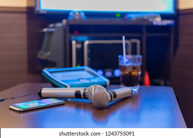 Microphone And Remote Control In Karaoke Box