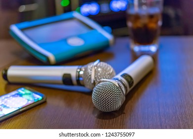 Microphone And Remote Control In Karaoke Box