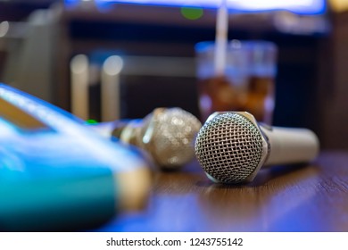 Microphone And Remote Control In Karaoke Box