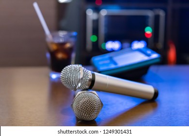 Microphone And Remote Control In Karaoke Box