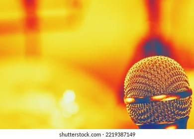 microphone in retro style on a blurred background place under the copy space. Thermography gradients, retro glitch, noise, selective focus