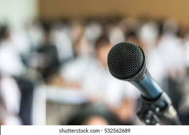 Microphone Speaker In Seminar Classroom, Lecture Hall Or Conference Meeting In Educational Business Event For Host, Teacher, Or Coaching Mentor 