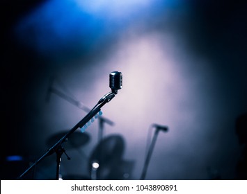 microphone in stage lights during concert