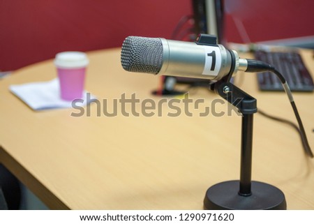 The microphone in the studio. Radio/mass media background