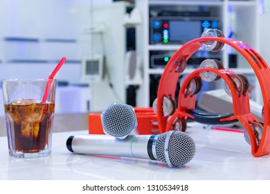 Microphone And Tambourine In Karaoke Box