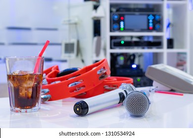 Microphone And Tambourine In Karaoke Box