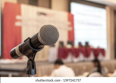 Microphone Voice Speaker In Business Seminar, Speech Presentation, Town Hall Meeting, Lecture Hall Or Conference Room In Corporate Or Community Event For Host Or Public Hearing