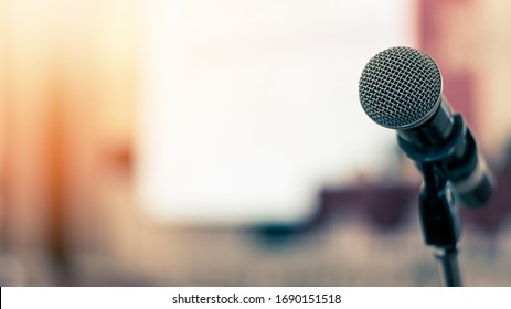 Microphone voice speaker in business seminar, speech presentation, town hall meeting, lecture hall or conference room in corporate or community event for host or townhall public hearing