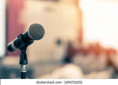 Microphone Voice Speaker In Business Seminar, Speech Presentation, Town Hall Meeting, Lecture Hall Or Conference Room In Corporate Or Community Event For Host Or Townhall Public Hearing