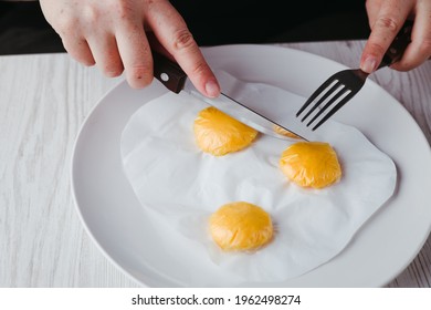 Microplastic In Food And Water, Environmental Pollution Problem. Woman Eating Artificial Food Products Made Of Plastic Bags. Human Health, Nutrition And Environment