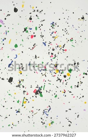 Microplastic, very dangerous waste generated by humans. Environmental education: small pieces of colored plastic, garbage that does not decompose, pollutes earth and water.