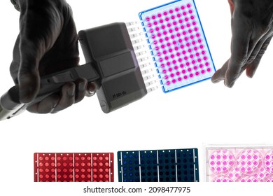 A microplate or microtiter plate or  microwell plate, multiwell,  is a flat plate with multiple  wells  used as small test tubes.  Microplate is a standard tool in analytical  