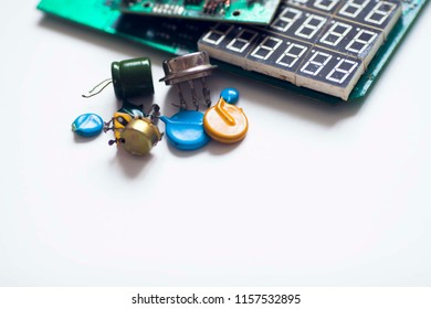 Microprocessor concept. Set of drivers, diodes, capacitors, inductance and other micro electronics on the white background. Top view. Space for a text. Close up.