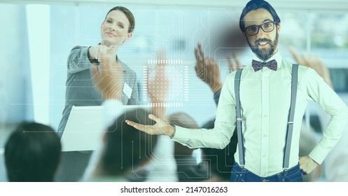 Microprocessor connection over man holding an invisible object against caucasian businesswoman. business and technology concept - Powered by Shutterstock