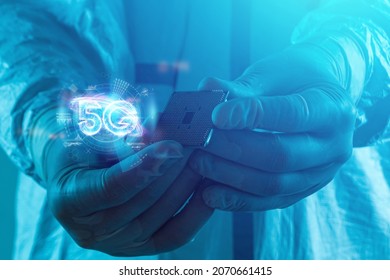 Microprocessor in hands Hologram 5G creative background on black background. 5G network concept, high speed mobile internet, new generation networks. Mixed media - Powered by Shutterstock - Get 15% off with code: PIKWIZARD15