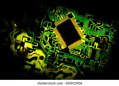 Microprocessor integrated circuit chip illuminated green