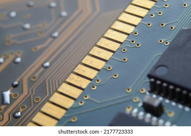 microprocessor on the background of the microcircuit of the motherboard