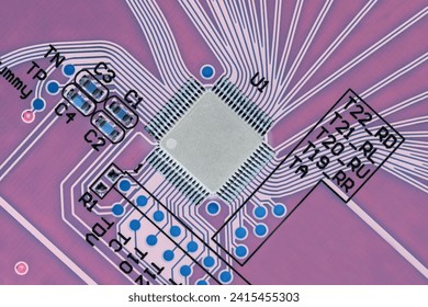 Microprocessor on a printed circuit board, close-up, top view, in inverted colors. Macro photography
