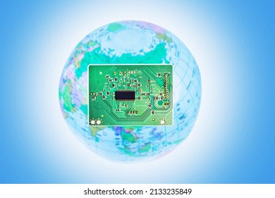 Microprocessors against an world background. Concept for crisis in the electronics industry. Production of computer chip.