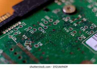 microscheme close up with plenty tiny pieces. Many capacitors, resistors on board. Digital engineering photo.