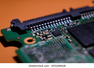 microscheme close up with plenty tiny pieces. Many capacitors, resistors on board. Digital engineering photo.