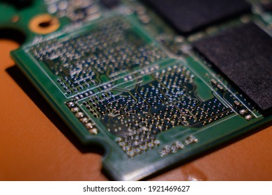 microscheme close up with plenty tiny pieces. Many capacitors, resistors on board. Digital engineering photo.