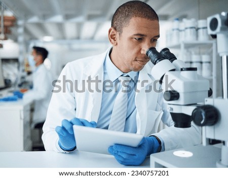 Microscope analysis, man and laboratory scientist working on healthcare research, pharma project or test sample. Science experiment, tablet and person typing results of hospital check, study or exam