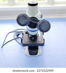 microscope for analysis in microbiology laboratories
