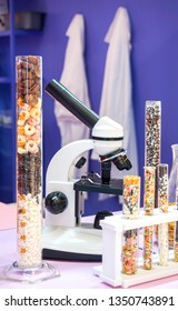 Microscope corn flake, chocolate, ice cream decoration In beakers and test tubes By simulating like a science laboratory