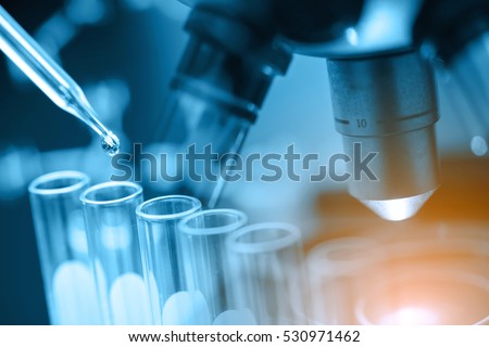 microscope with lab glassware, science laboratory research and development concept Stockfoto © 