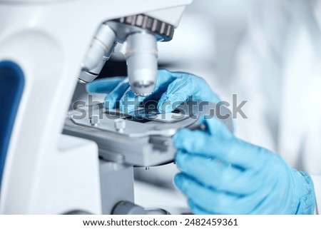 Microscope, laboratory and hands of scientist checking sample for pharmaceutical medicine. Biotech engineering, person or medical technician, science innovation and research study for vaccine drugs