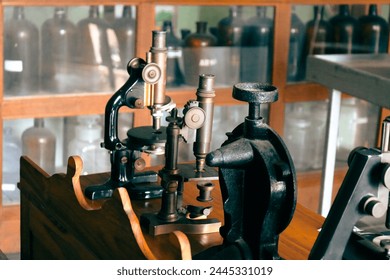 Microscope on table for vintage science background