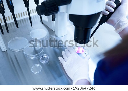 Microscope of reproductive medicine clinic fertilizing egg outside female body