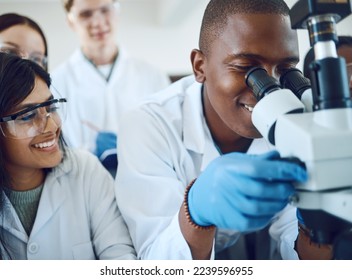 Microscope, science and scientist team with study test for research, medicine innovation and biotechnology in healthcare. Pharmaceutical students in a laboratory working on bacteria or dna results - Powered by Shutterstock