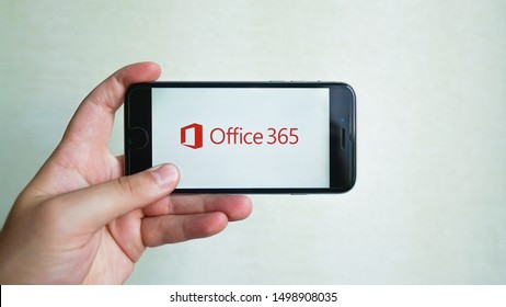 Microsoft office 365 logo on smartphone screen placed in the hands of man. 
Los Angeles, California, USA - September 2019