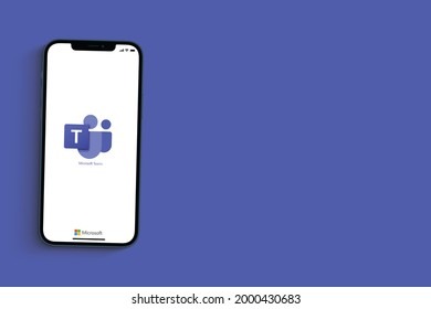 Microsoft Teams app on smartphone screen on blue background. Communication and collaboration platform that combines chat, video conferencing. Rio de Janeiro, RJ, Brazil. June 2021.