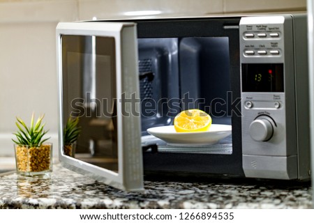 Microwave cleaning using lemon 