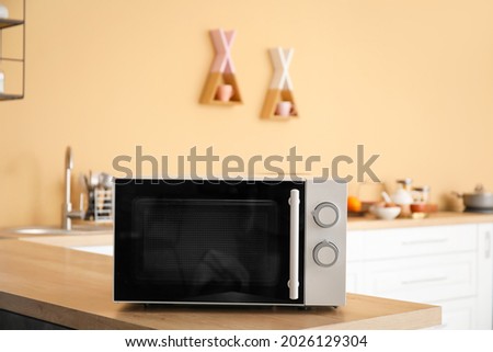 Microwave oven on kitchen counter