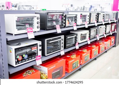 Microwave Ovens And Grills In An Electronics Store. Electro Home Appliances. Sale Of Goods On Black Friday In A Shopping Center. Household Appliances In Stock.Almaty, Kazakhstan May 15, 2020