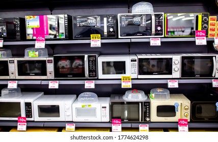 Microwave Ovens And Grills In An Electronics Store. Electro Home Appliances. Sale Of Goods On Black Friday In A Shopping Center. Household Appliances In Stock.Almaty, Kazakhstan May 15, 2020