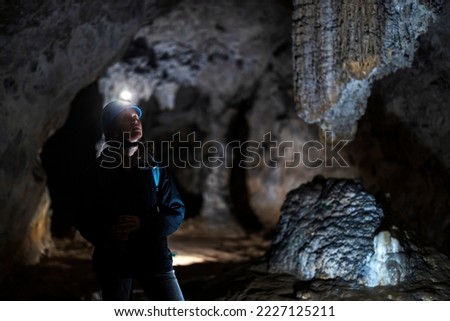 Mid Adult Caucasian Woman on Speleology Journey in Underground Caves - Zelske Caves, Slovenia