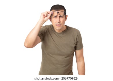 Mid Adult With Glasses Straining His Eyes Because He Can't See, Isolated With White Background